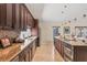Bright, modern kitchen with granite countertops, stainless steel appliances, and mosaic tile backsplash at 4704 Coral Lake Dr, Bradenton, FL 34210