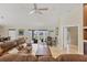 The spacious living room offers access to the lanai with large sliding glass doors at 4704 Coral Lake Dr, Bradenton, FL 34210
