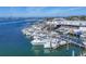 Lively marina scene featuring numerous fishing boats docked, with the distant skyline adding to the coastal charm at 4704 Coral Lake Dr, Bradenton, FL 34210