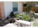 A tranquil water feature and lush greenery add a touch of serenity to the home's outdoor landscape at 5311 E 47Th St, Bradenton, FL 34203