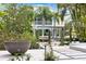 Well-maintained backyard landscaping with canal access and boat lift nearby at 600 De Narvaez Dr, Longboat Key, FL 34228