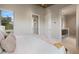 Bedroom showcasing a view into the walk-in closet and bathroom, emphasizing an open layout at 600 De Narvaez Dr, Longboat Key, FL 34228