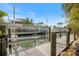 This home has dock access to the canal with a boat lift for easy access to the water at 600 De Narvaez Dr, Longboat Key, FL 34228