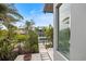 Beautiful home with lush landscaping and a view of the neighborhood canal at 600 De Narvaez Dr, Longboat Key, FL 34228