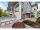 Modern home featuring an outdoor shower, lush landscaping, and a relaxing pool area at 600 De Narvaez Dr, Longboat Key, FL 34228