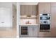 Stylish kitchen with stainless steel appliances, wine cooler, ample cabinet space, and modern countertops at 600 De Narvaez Dr, Longboat Key, FL 34228