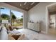 Bright living room featuring stylish furniture, large windows with natural light, and elegant décor at 600 De Narvaez Dr, Longboat Key, FL 34228