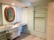 Bathroom featuring a sink with drawers and an oval mirror at 6408 2Nd W Ave, Bradenton, FL 34209