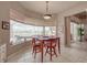 Sunlit breakfast nook with views and patio access providing a scenic dining experience steps from outdoor relaxation at 6605 Waters Edge Way, Lakewood Ranch, FL 34202
