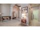 Elegant foyer with tile flooring, decorative lighting, and stylish furnishings at 6605 Waters Edge Way, Lakewood Ranch, FL 34202