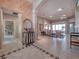 Grand foyer with decorative tile flooring leading into the spacious living areas at 6605 Waters Edge Way, Lakewood Ranch, FL 34202