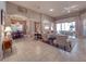 Bright, open-concept living space with views of the dining area and access to the screened-in patio at 6605 Waters Edge Way, Lakewood Ranch, FL 34202