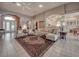 Bright living room featuring tile floors, comfortable seating, and elegant decor at 6605 Waters Edge Way, Lakewood Ranch, FL 34202