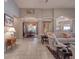 Open-concept living room boasts great light, architectural details, and seamless flow to other living spaces for an inviting atmosphere at 6605 Waters Edge Way, Lakewood Ranch, FL 34202