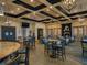 Elegant clubhouse featuring a cozy fireplace, stylish seating, and a welcoming atmosphere for social gatherings at 6611 Grand Estuary Trl # 105, Bradenton, FL 34212