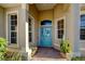 Charming entryway features a decorative glass door, sidelight windows, and brick flooring at 6619 Copper Ridge Trl, Bradenton, FL 34201