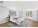 Bright bedroom with three large windows, and hard wood floors at 6737 Lincoln Rd, Bradenton, FL 34203