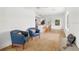 Bright living room with modern ceiling fan and an open layout to the kitchen area at 6737 Lincoln Rd, Bradenton, FL 34203