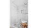 Modern tile shower with mosaic tile flooring and built-in storage at 6737 Lincoln Rd, Bradenton, FL 34203