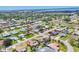 Aerial view of neighborhood showcasing the property, surrounding homes, and tree-lined streets at 6820 19Th W Ave, Bradenton, FL 34209
