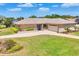 Well-maintained ranch style home with a two car garage, lush lawn and mature landscaping at 6820 19Th W Ave, Bradenton, FL 34209