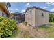 Backyard shed offering extra storage space, accompanied by lush greenery and the screened in pool area at 6820 19Th W Ave, Bradenton, FL 34209