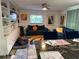 Inviting living room features comfortable seating, colorful accents, and natural light, creating a cozy atmosphere at 7036 Clark Rd, Sarasota, FL 34241