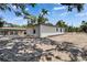 Rear exterior view of home showing lot and simple architectural style at 732 15Th E St, Bradenton, FL 34208