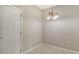 Dining room area featuring tile floors and a classic light fixture at 7687 Sweetbay Cir # 7687, Bradenton, FL 34203