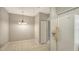 Dining area with chandelier and access to kitchen at 7687 Sweetbay Cir # 7687, Bradenton, FL 34203