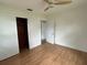 Bedroom offering wood floors, a ceiling fan, and closet at 775 Liberty St, Englewood, FL 34223