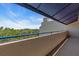 Scenic aerial view featuring a blue railing and waterway, showing lush landscaping at 835 S Osprey Ave # 415, Sarasota, FL 34236