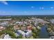 Panoramic aerial shot of condo community by the bay, lush landscaping, and convenient access to nearby amenities at 835 S Osprey Ave # 415, Sarasota, FL 34236