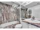 Elegant bathroom with a marble shower, vanity, and bathtub at 835 S Osprey Ave # 415, Sarasota, FL 34236