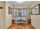 Cozy breakfast nook with a round table, two chairs, and natural light at 835 S Osprey Ave # 415, Sarasota, FL 34236
