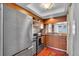 Bright kitchen featuring stainless steel appliances, wood cabinets, tiled floors, and ample natural light at 835 S Osprey Ave # 415, Sarasota, FL 34236