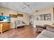 Stylish living room with hardwood floors, comfortable seating, and media console at 835 S Osprey Ave # 415, Sarasota, FL 34236