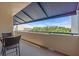 Relaxing patio space with outdoor seating and a scenic view, perfect for enjoying the outdoors at 835 S Osprey Ave # 415, Sarasota, FL 34236