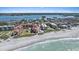 An aerial view of condos on a beach with waterfront access and views at 8735 Midnight Pass Rd # 306B, Sarasota, FL 34242