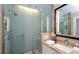 Beautiful bathroom featuring a glass-enclosed shower, elegant vanity, and modern fixtures at 915 Seaside Dr # 613 Weeks 32-33, Sarasota, FL 34242