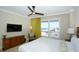 Bright bedroom with a ceiling fan, and ocean view, offering a serene retreat at 915 Seaside Dr # 613 Weeks 32-33, Sarasota, FL 34242