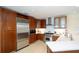 Well-equipped kitchen with stainless steel appliances, custom cabinetry, and bright countertops at 915 Seaside Dr # 613 Weeks 32-33, Sarasota, FL 34242