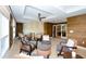 Comfortable sitting area with stylish chairs, ceiling fan, and views to an additional seating area at 915 Seaside Dr # 613 Weeks 32-33, Sarasota, FL 34242