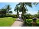 Picturesque wooden walkway through lush greenery at 915 Seaside Dr # 613 Weeks 32-33, Sarasota, FL 34242