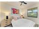 Cozy bedroom with a window and two nightstands at 10015 Marbella Dr, Bradenton, FL 34211