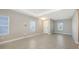Bright living room boasts neutral paint, recessed lighting, and large windows at 10054 Cross River Trl, Parrish, FL 34219