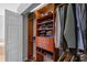 Closet featuring custom wood shelving, drawers, and hanging rods, providing ample storage space at 11716 Strandhill Ct, Lakewood Ranch, FL 34202