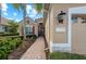 Exterior detail of home with well-maintained landscaping and elegant stone accents at 11716 Strandhill Ct, Lakewood Ranch, FL 34202