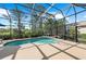 Sparkling screened-in pool and spa, offering privacy and a relaxing outdoor retreat at 11716 Strandhill Ct, Lakewood Ranch, FL 34202