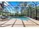 Beautiful screened-in pool with sun loungers, ideal for enjoying the Florida sunshine at 11716 Strandhill Ct, Lakewood Ranch, FL 34202